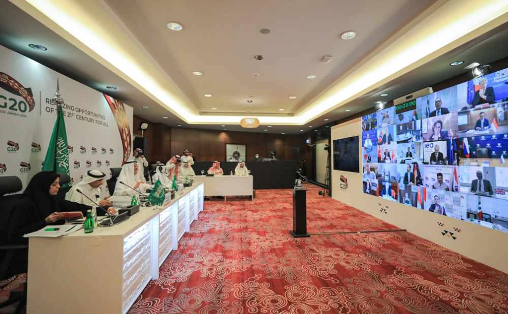 A handout photo released by the Saudi Energy Ministry on April 10, 2020 shows Saudi Arabia's Energy Minister Abdulaziz bin Salman (3rd-L) chairing a virtual extraordinary meeting of G20 Oil ministers, in the capital Riyadh. (AFP)