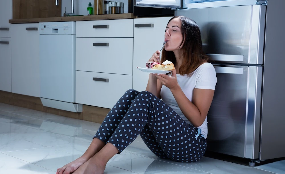 Isolating at home could trigger unhealthy eating habits. Shutterstock