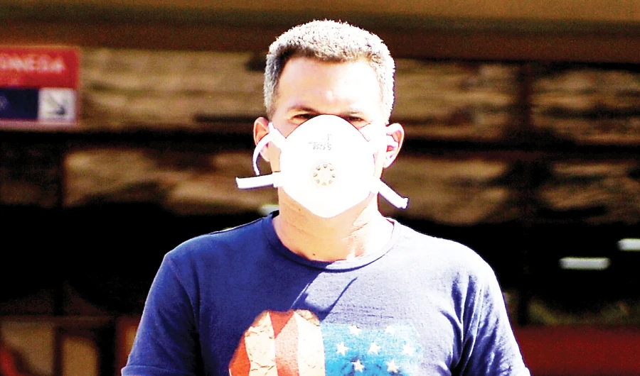 Cuba has started the production of one million face masks for citizens, but still faces problems securing items such as ventilators from abroad due to US sanctions. (AFP)