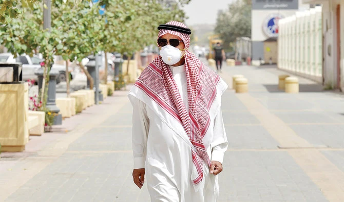 According to the WHO, people can catch COVID-19 from others who have the virus. The disease can spread from person to person through small droplets from the nose or mouth. (File/AFP)
