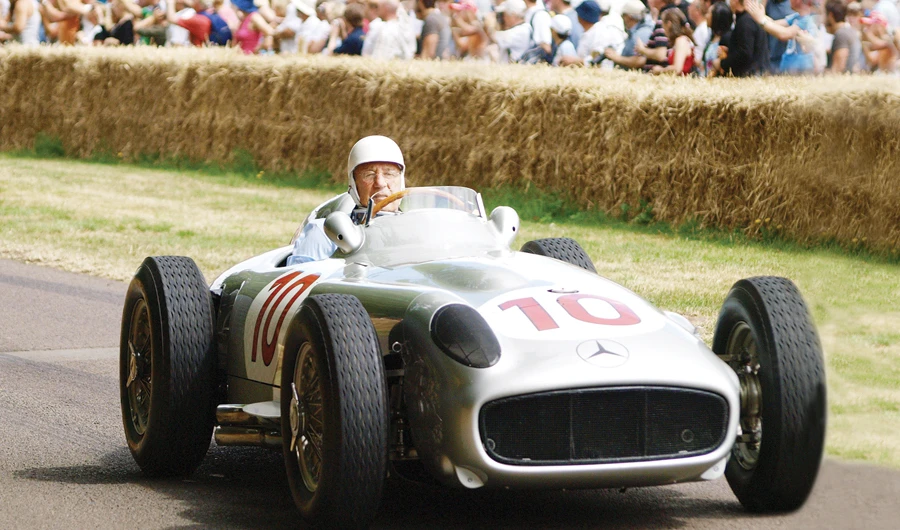 In this file photo taken on July 5, 2009 Britain’s Stirling Moss drives his 1954 Mercedes Benz W196 racing car at Goodwood’s Festival of Speed. (Files/AFP)