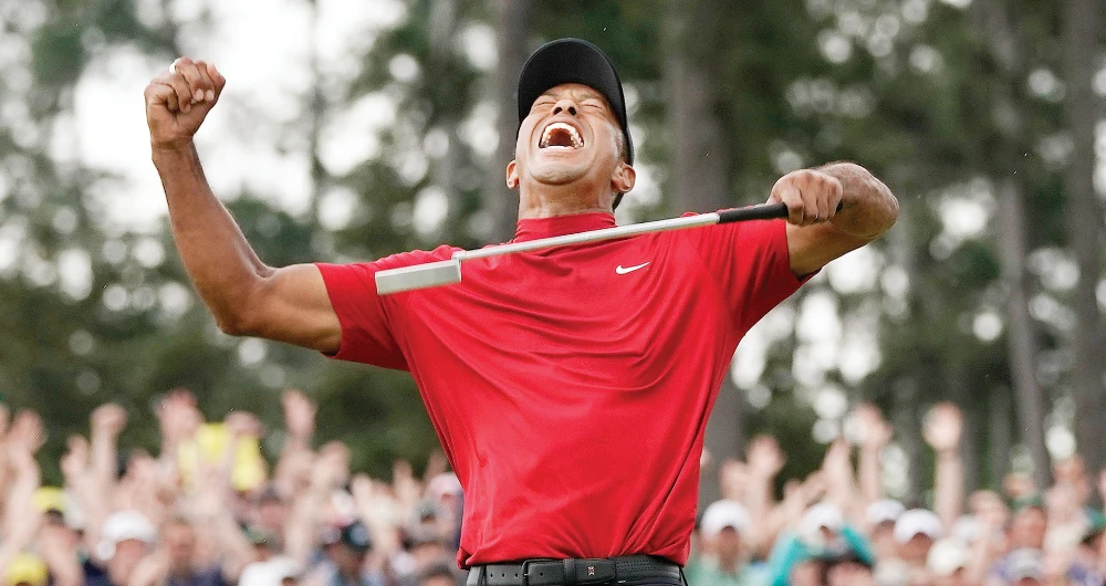 I don’t remember screaming. I don’t remember putting my arms up. It was one of those blackout moments, says Tiger Woods (AP)