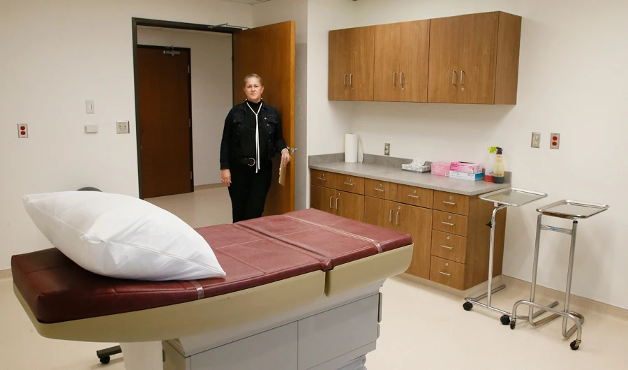 In this Friday, Sept. 16, 2016 file photo, Trust Women's founder and CEO Julie Burkhart stands in the doorway of an operating room at the Trust Women South Wind Women's Center in Oklahoma City, where licensed physicians are providing services, including abortions, OB-GYN care, family planning, adoption and emergency contraception. (AP)