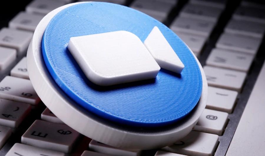 A 3D printed Zoom logo is placed on the keyboard in this illustration taken April 12, 2020. (REUTERS)