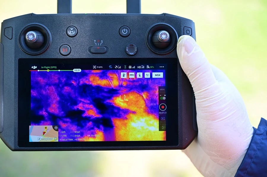 Operators of thermal imaging technology can see live footage that will highlight likely infected people. (AFP)