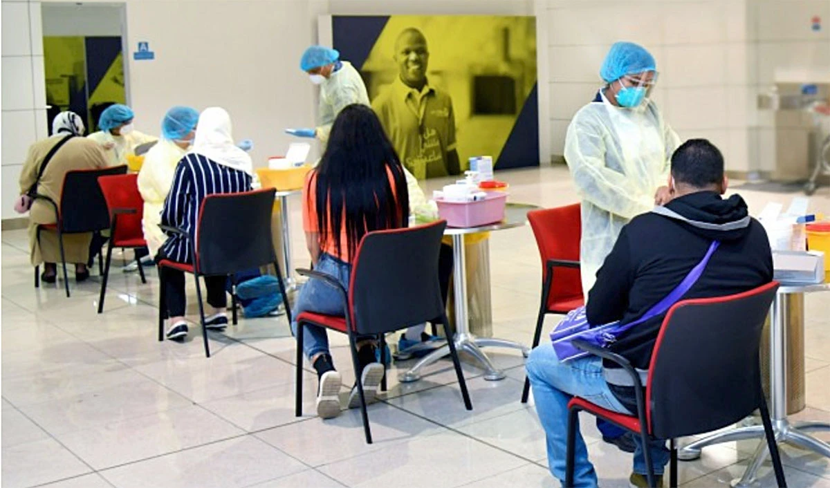 Passengers undergo blood testing for COVID-19 before boarding an Emirates flight to Tunisia at Dubai International Airport on April 15, Dubai. (Photo courtesy: Emirates Airlines)