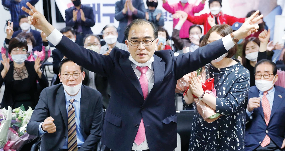 Thae Yong-Ho, center, a candidate of United Future Party, after winning a seat in the National Assembly during general elections in Seoul. (AP)