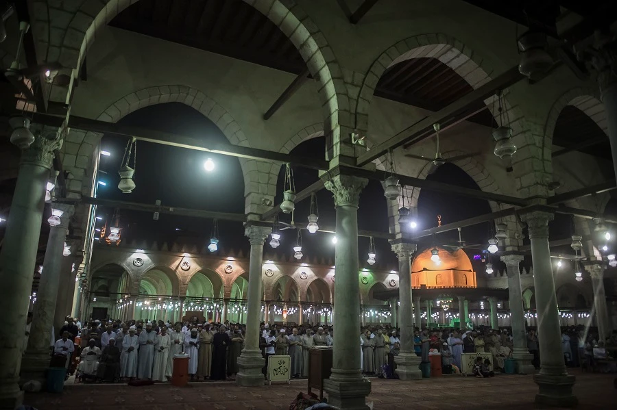 Egyptians chant the Tarawih recitations on the occasion of Laylat al-Qadr during the fasting month of Ramadan at Cairo's historic mosque of Amr Ibn al-Aas on June 6, 2018. (File/AFP)
