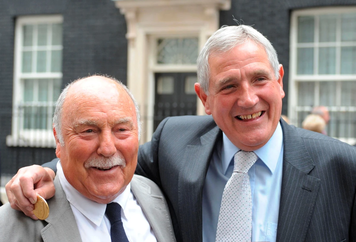 Former England footballers Jimmy Greaves, left, and Norman Hunter at 10 Downing Street, to receive World Cup winners’ medals as members of the 1966 squad, London, June 10, 2009.