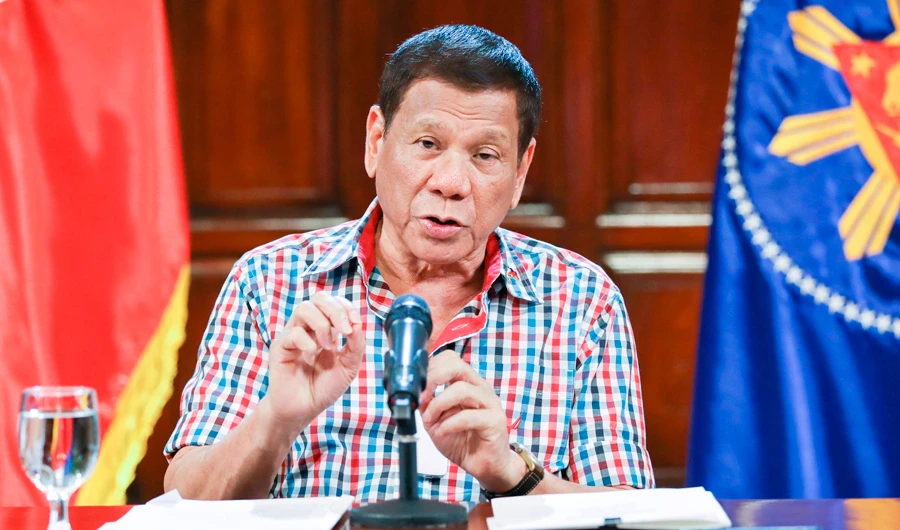 In this April 16, 2020, photo provided by the Malacanang Presidential Photographers Division, Philippine President Rodrigo Duterte speaks to the nation about the government's efforts to prevent the spread of the coronavirus that causes the COVID-19 disease during a televised address from Malacanang palace in Manila, Philippines. (AP)