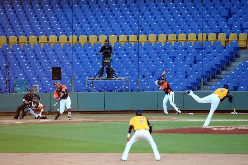 Above, the opening match between Uni President Lions against Chinatrust Brothers during the Chinese Professional Baseball League at the Taichung International Baseball Stadium on April 12, 2020. (AFP file photo)