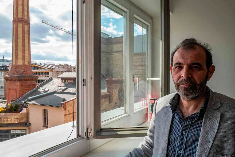 Syrian human rights lawyer Anwar Al-Bunni poses in his office in Berlin on April 9, 2020. (File/AFP)