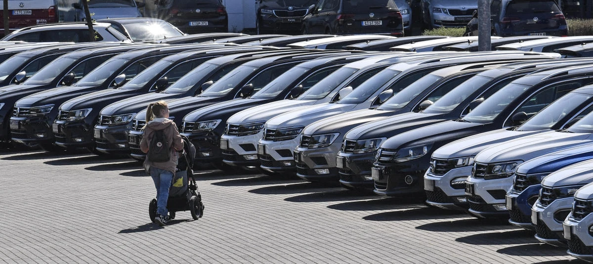 Above, a Volkswagen car dealership in Essen, Germany. Volkswagen Group’s sales decreased by 43.6 percent in March. (AP)