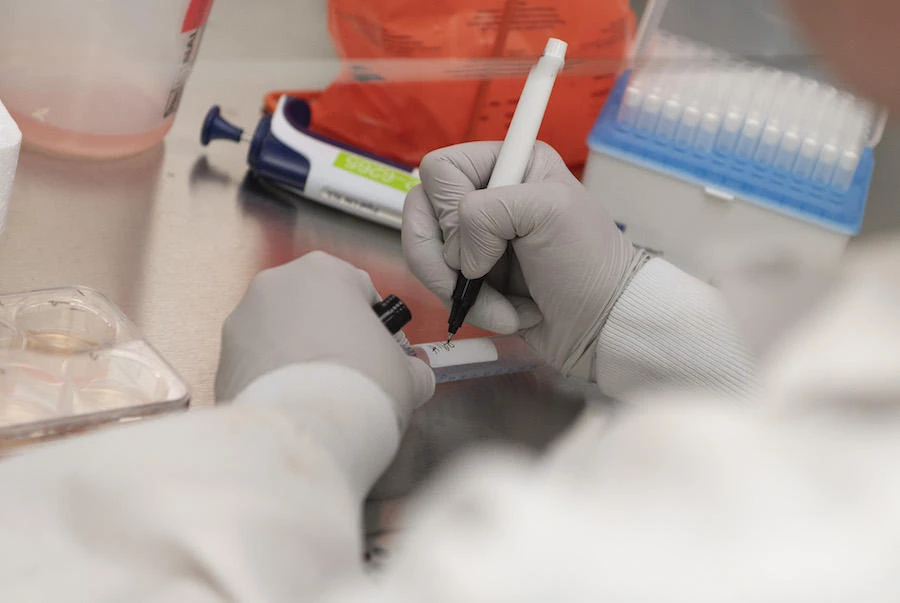 Dr. Rhonda Flores labels protein samples at Novavax labs in Rockville, Maryland on March 20, 2020, one of the labs developing a vaccine for the coronavirus, COVID-19. (File/AFP)