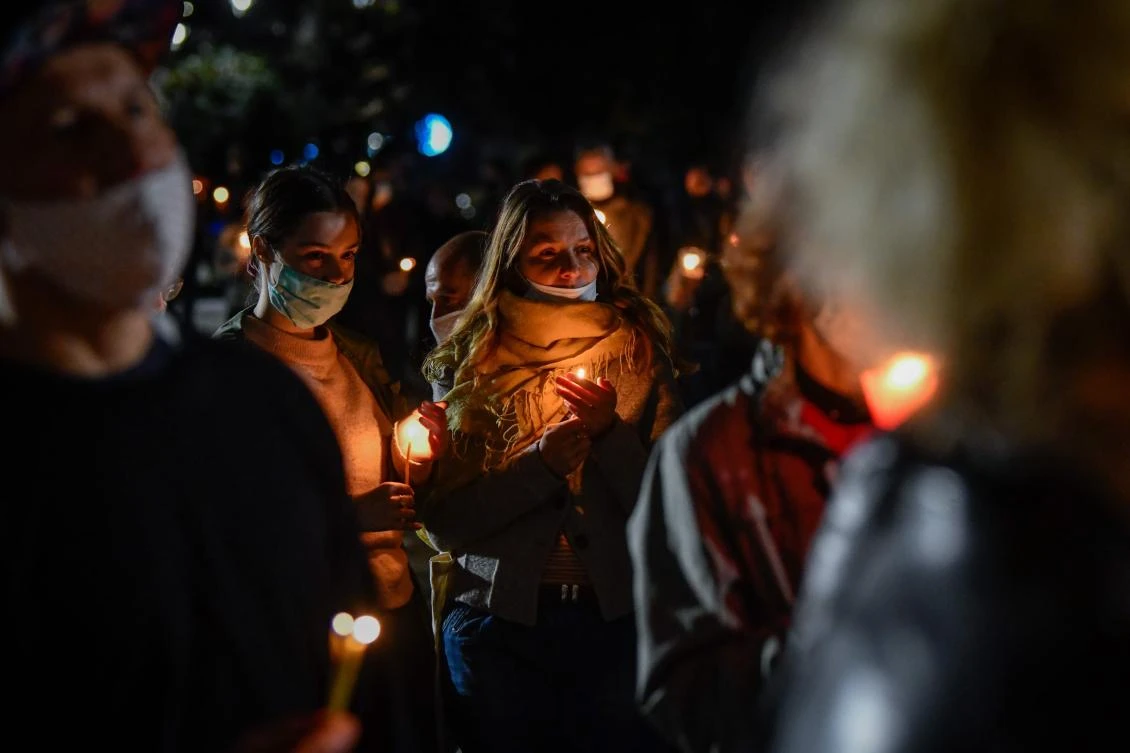 Orthodox worshippers hold candles during the Easter midnight mass in front of the golden-domed Alexander Nevski Cathedral in Sofia on April 18, 2020, amid the COVID-19 pandemic caused by the novel coronavirus. (File/AFP)
