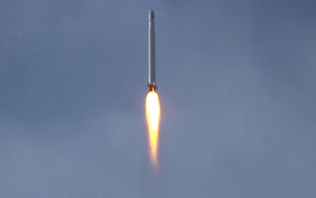 An image grab from footage obtained from the state-run Iran Press news agency allegedly shows an Iranian military satellite -- dubbed the Nour -- which the Revolutionary Guards said on April 22, 2020 was launched from the Qassed two-stage launcher in the Markazi desert, a vast expanse in Iran's central plateau, amid tensions with US. (AFP)