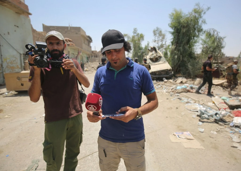 Journalists covering events in the embattled city of Mosul, Iraq in this June 20, 2017 file photo. (AFP)