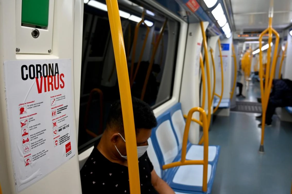 Spain’s latest casualty figures are the lowest daily toll since March 22 when 394 deaths were reported. Above, a commuter on the metro in Madrid on April 20, 2020. (AFP)
