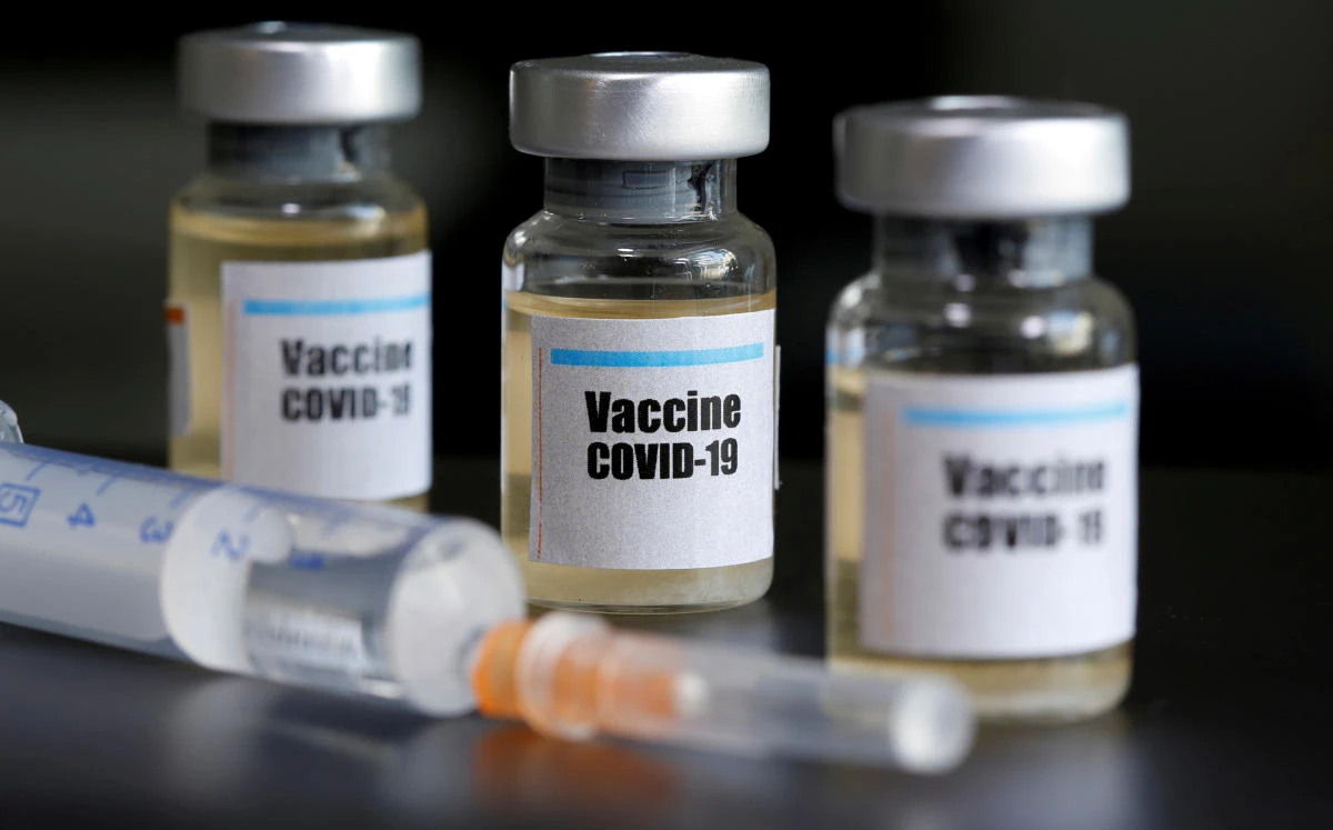 Small bottles labbeled with a "Vaccine COVID-19" sticker and a medical syringe are seen in this illustration taken taken April 10, 2020. (Reuters)
