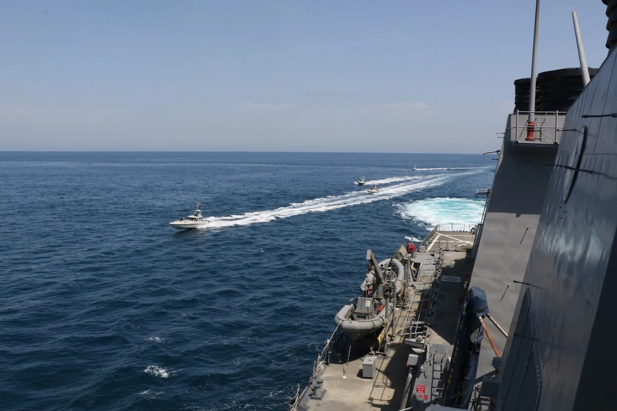 Iranian Islamic Revolutionary Guard Corps Navy (IRGCN) vessels conduct unsafe and unprofessional actions against USS Paul Hamilton (DDG 60) on April 15, 2020. (AFP)