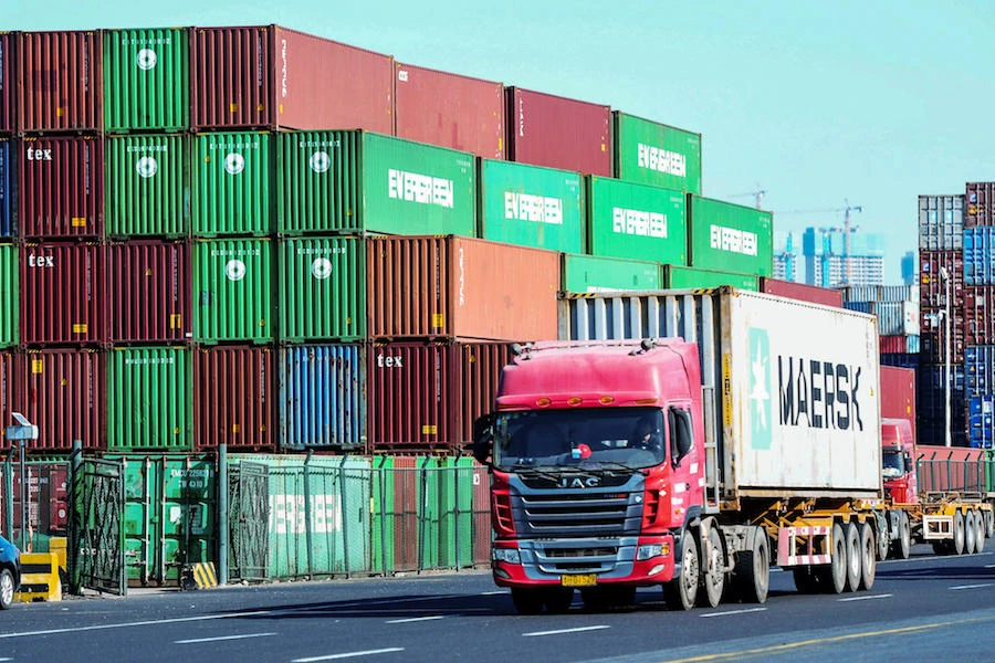 Containers are stacked at the port in Qingdao, in China's eastern Shandong province on November 8, 2019. (File/AFP)