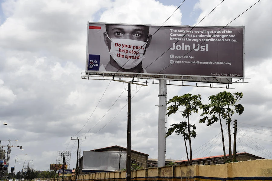 A billboard mounted at the Airport Road to campaign against the spread of the COVID-19 coronavirus is seen in Ikeja in Lagos, on April 20, 2020. (AFP)
