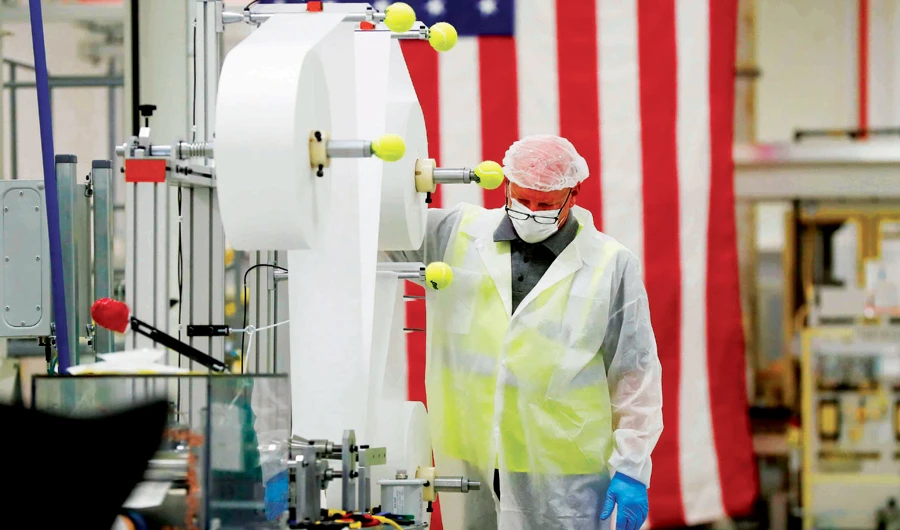 Despite risks, auto workers start making medical gear