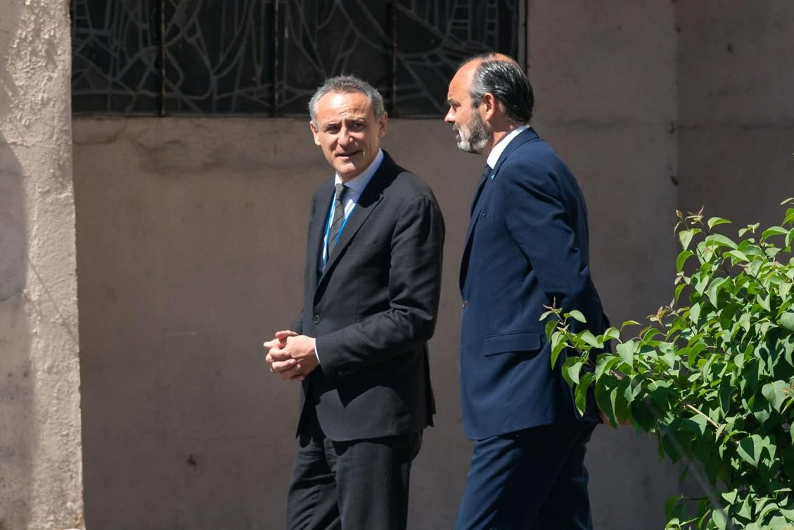 French Prime Minister Edouard Philippe speaks with Managing Director of University Hospital of Strasbourg (HUS) Christophe Gautier, during a visit at the hospital in Strasbourg, eastern France, on April 23, 2020, on the 38th day of a strict lockdown in France to stop the spread of COVID-19. (File/AFP)