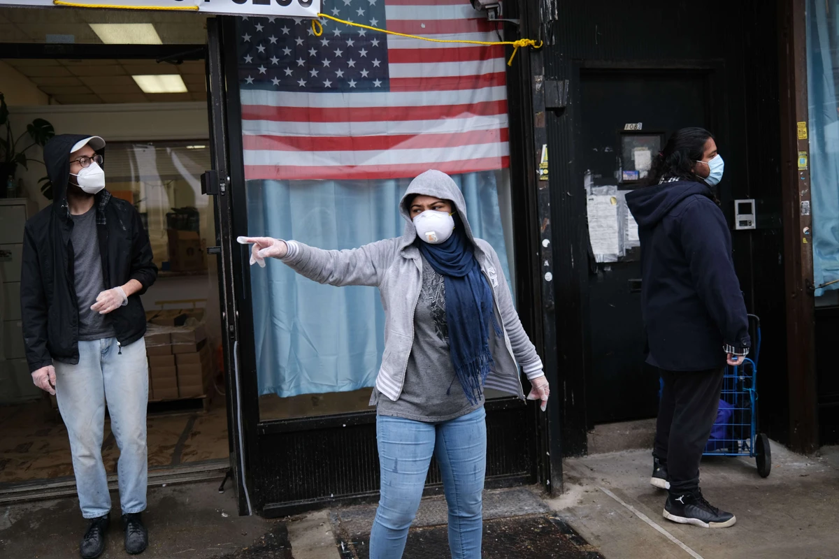 Food is distributed to those in need outside of a mosque and cultural center in the United States during Ramadan on April 24, 2020 in New York City. (AFP)