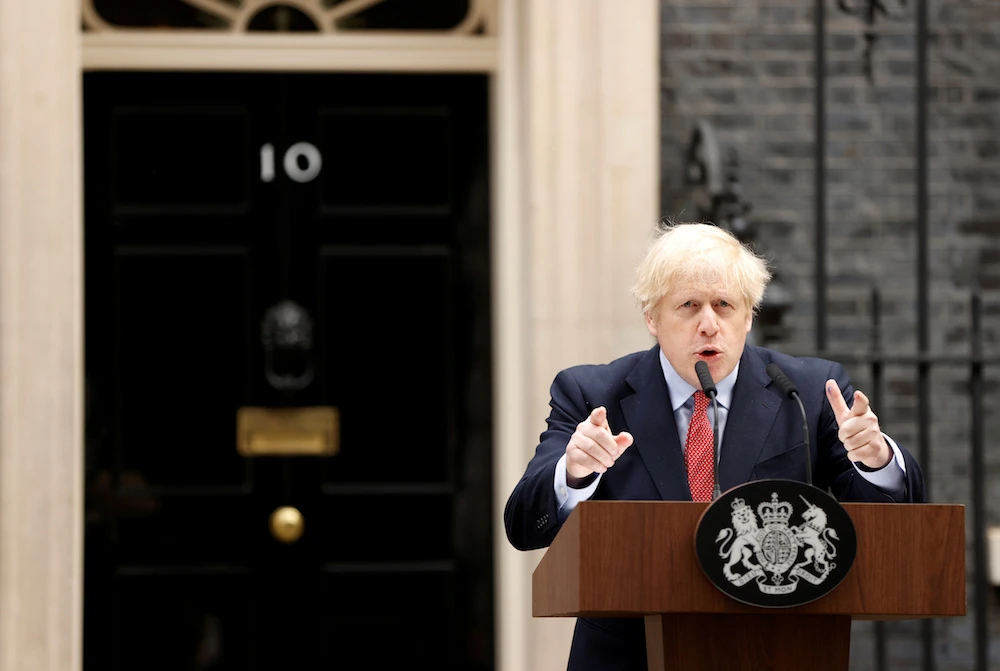 Outside 10 Downing Street, UK Prime Minister Boris Johnson urged his lockdown-weary nation to be patient Monday, arguing that easing social and economic restrictions too soon would create a second deadly spike of coronavirus infections. (Reuters)