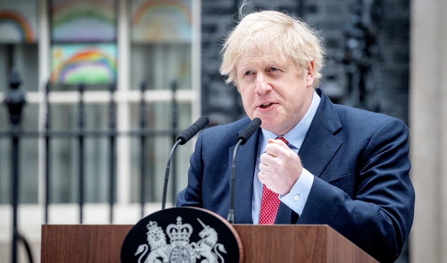 UK Prime Minister Boris Johnson gives a statement outside 10 Downing Street, as he returns to work on Monday after recovering from coronavirus. (AFP)