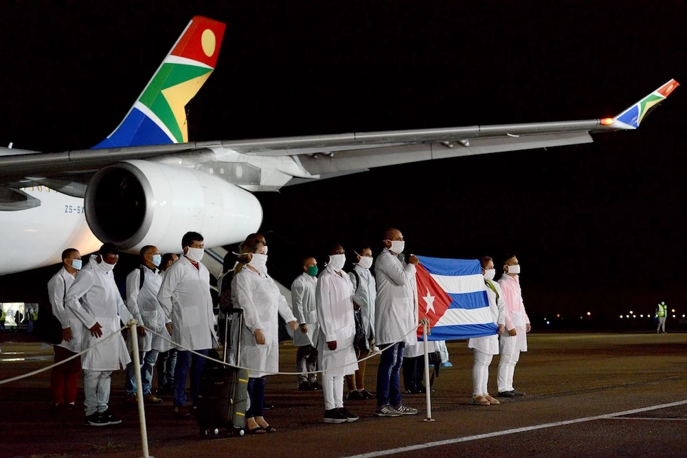 Cuban Health Specialists arriving at the Waterkloof Air Force Base in Pretoria, South Africa, to support efforts to curb the spread of the COVID-19 coronavirus. (File/DIRCO/AFP)