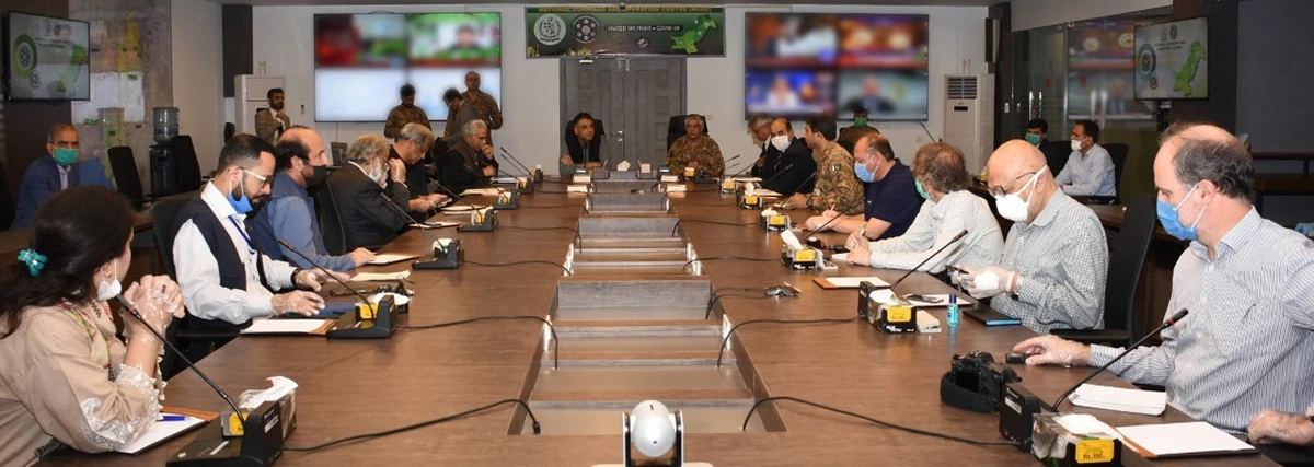 Planning and Development Minister Asad Umer briefs reporters on the role of the National Command and Operation Center (NCOC) in Islamabad on Wednesday. (AN Photo)