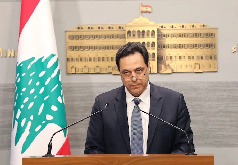 Lebanese Prime Minister Hassan Diab delivering a statement at the governmental palace in the capital Beirut. (File/AFP)