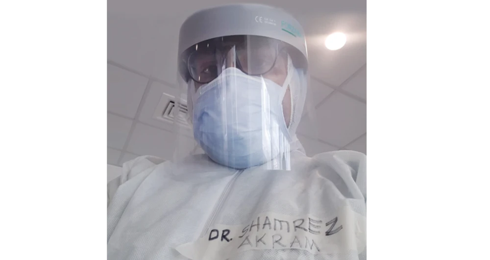 Dr. Shamrez Akram is seen while on duty Thursday as frontline worker in the fight against COVID-19. (Supplied)