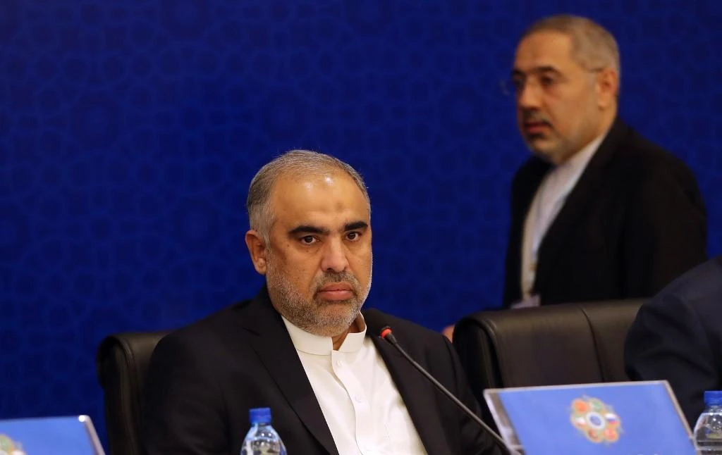 Asad Qaiser, seated, the speaker of Pakistan’s National Assembly, had tested positive for COVID-19 on Thursday. (AFP)