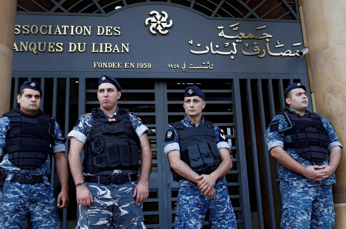 Lebanese police stand outside the entrance of the Association of Banks in downtown Beirut, Lebanon on November 1, 2019. (Reuters/File Photo)