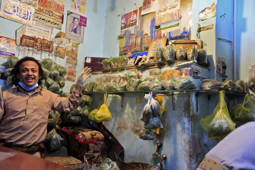 A Yemeni vendor displays bag of qat, the ubiquitous mild narcotic, at a market in the capital Sanaa on May 1, 2020. (AFP / Mohammed Huwais)