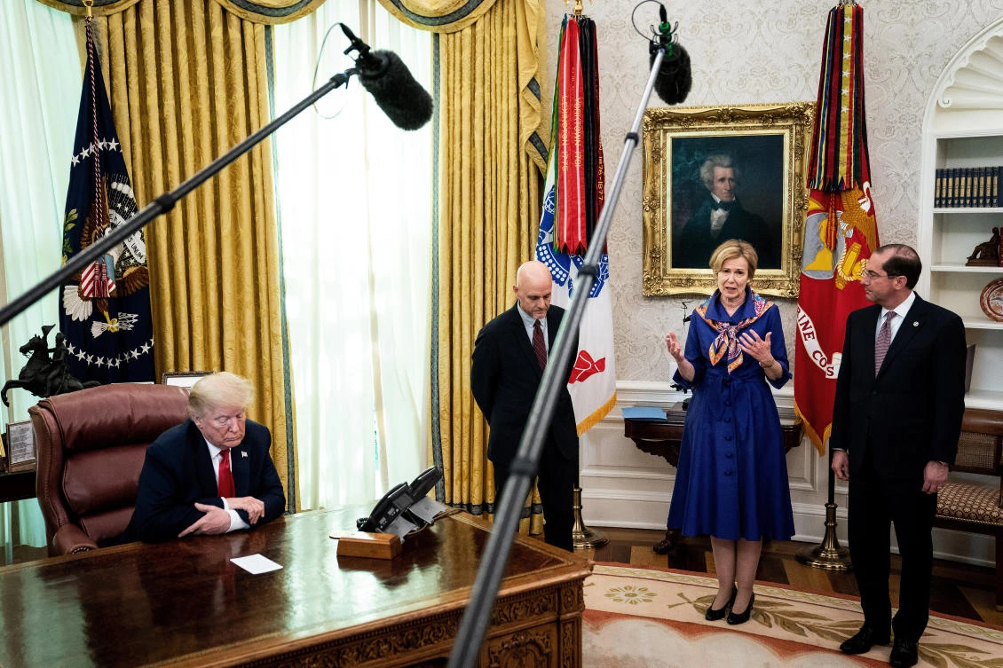 US President Donald Trump (L) is joined by (2nd L-R) Food and Drug Administration head Stephen Hahn, White House coronavirus task force coordinator Dr. Deborah Birx and Health and Human Services Secretary Alex Azar to announce that the Food and Drug Administration issued an emergency approval for the antiviral drug remdesivir. (Erin Schaff-Pool/Getty Images/AFP)
