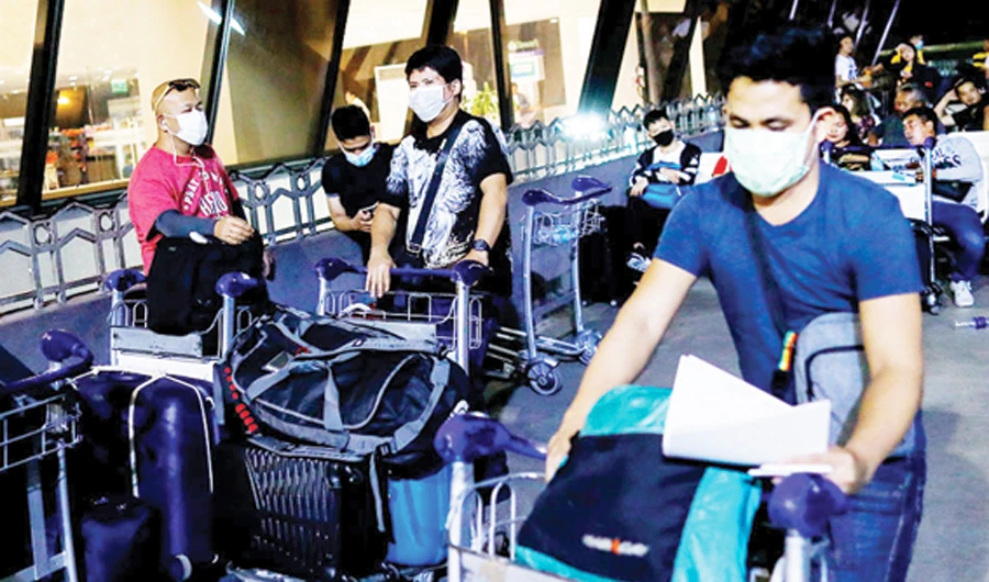 The government has already accommodated more than 20,000 repatriates who are quarantined in Metro Manila. (Files/Reuters)