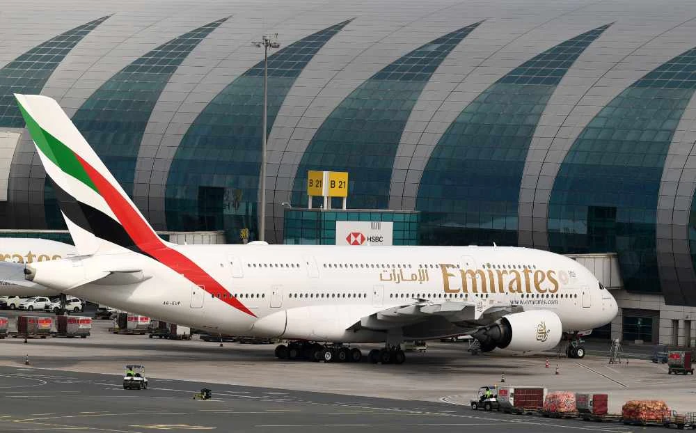 An Emirates Airbus A380-842 aircraft is pictured grounded at Dubai international Airport in Dubai after the airline suspended all passenger operations amid the COVID-19 coronavirus pandemic. (AFP / KARIM SAHIB