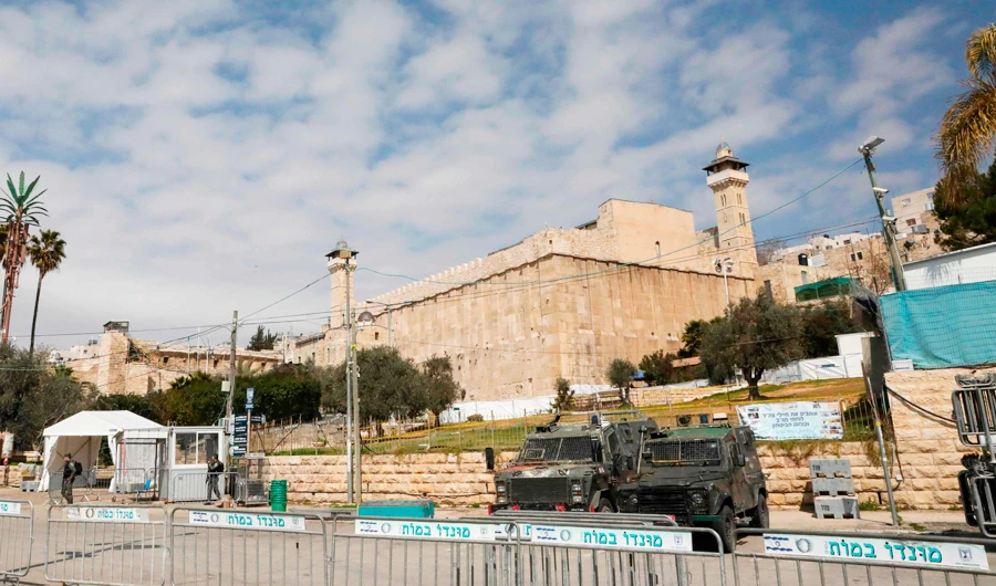 Israeli soldiers stand guard at the Ibrahimi mosque in the divided West Bank town of Hebron on February 23, 2020. (AFP)