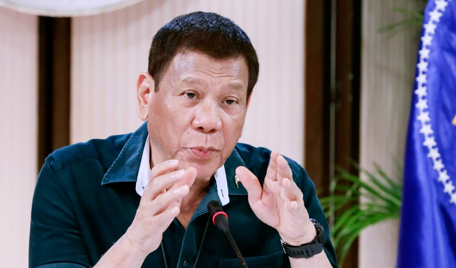 In this May 4, 2020, photo provided by Malacanang Presidential Photographers Division, Philippine President Rodrigo Duterte gestures as he talks to cabinet officials during a meeting at the Malacanang presidential palace in Manila, Philippines. (AP)