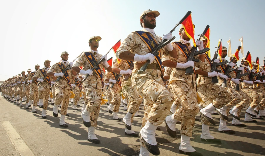 Members of the Iranian revolutionary guard march during a parade to commemorate the anniversary of the Iran-Iraq war (1980-88), in Tehran September 22, 2011. (REUTERS)