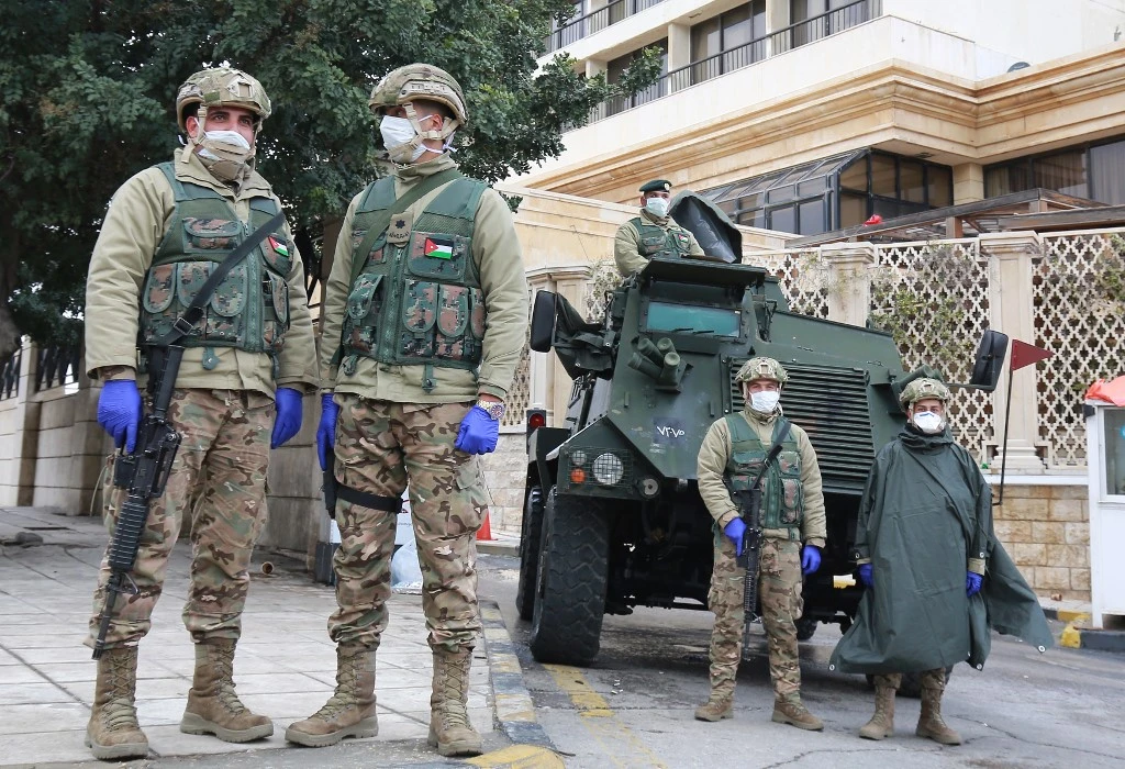 Jordanian soldiers keep watch on March 18, 2020 in the capital Amman as Jordan takes measures to fight the spread of the coronavirus COVID-19. (File/AFP)