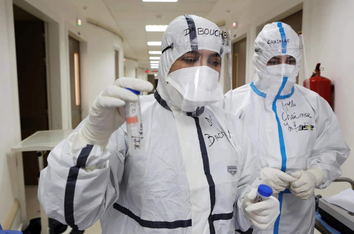 A file photo shows Doctor Meryem Bouchbika holds a sample tube in the Intensive Care Unit (ICU) at Prince Moulay Abdellah hospital as the spread of the coronavirus disease (COVID-19) continues in Sale, Morocco April 22, 2020. Picture taken April 22, 2020. (Reuters)