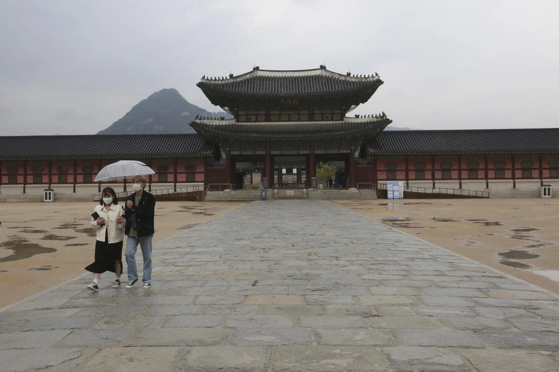 Tourist arrivals fell by 22 percent in the first quarter of the year, with Asia and Europe suffering the deepest declines. Above, visitors at Gyeongbok Palace, the main royal palace during the Joseon Dynasty, in Seoul, South Korea. (AP)