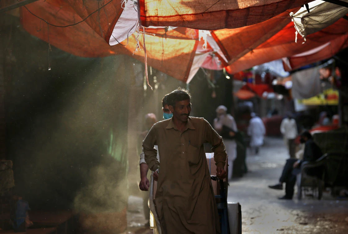 Prime Minister Imran Khan has announced plans to begin lifting Pakistan’s poorly enforced lockdown from Saturday, but added that restrictions could be restored if the coronavirus outbreak worsens. (AP)