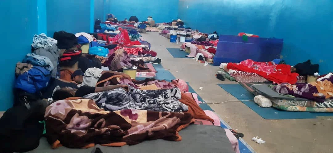 Migrants resting on the floor of a detention centre, amidst concerns over the spread of the coronavirus disease (COVID-19), in the city of Zawiya, Libya. (Reuters)