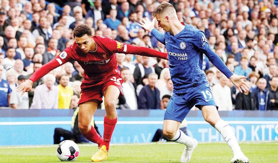 Liverpool’s Trent Alexander-Arnold and Chelsea’s Mason Mount in action during a 2019 Premier League match at Stamford Bridge, London. (Reuters/File)
